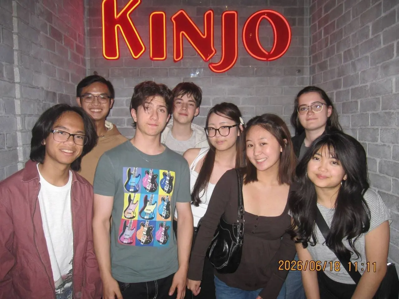 Simon Maxam with a group of friends outside Kinjo